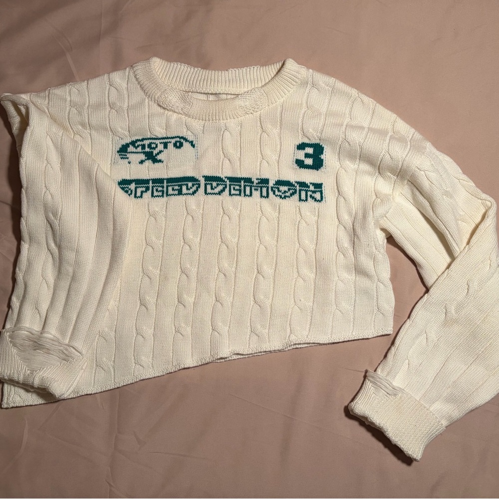 White Cable Knit Asymmetrical Cropped Sweater with Green Graphic